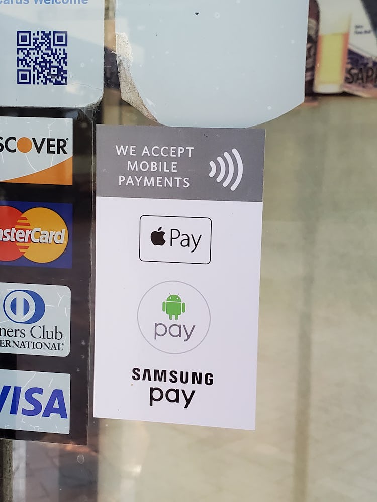 A photo of a "we accept mobile payments" sticker.