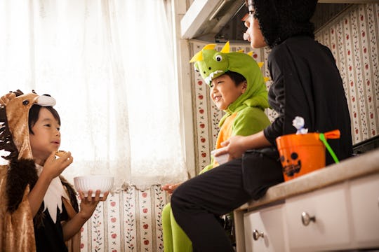 kids eating in kitchen on halloween