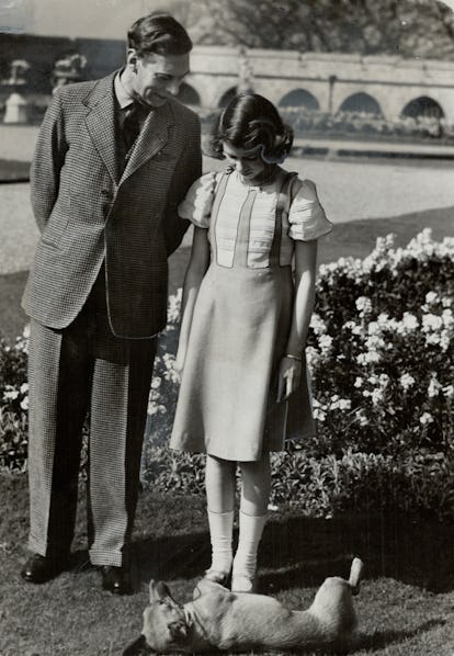 Vintage photo of Queen Elizabeth II with her corgis
