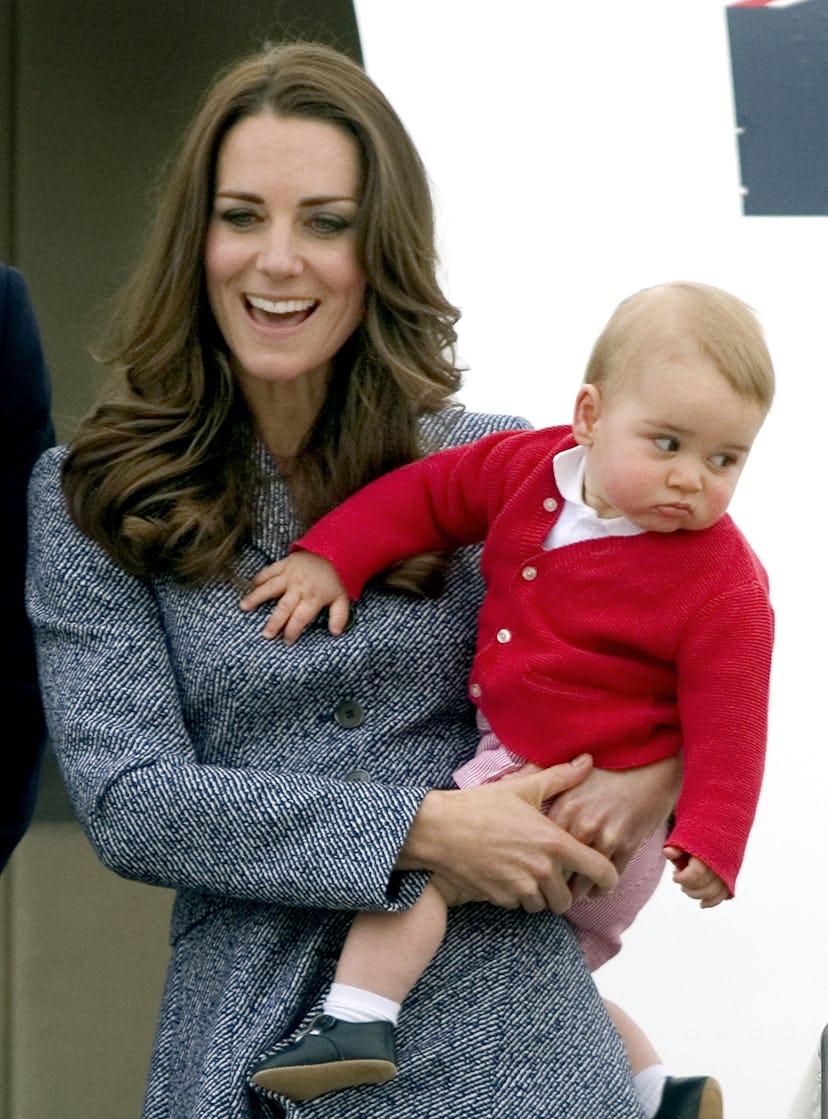 Prince George looks too sweet in a tiny, red cardigan