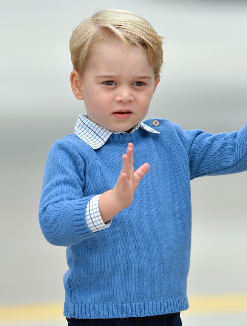 Prince George wears a layered sweater and button-up