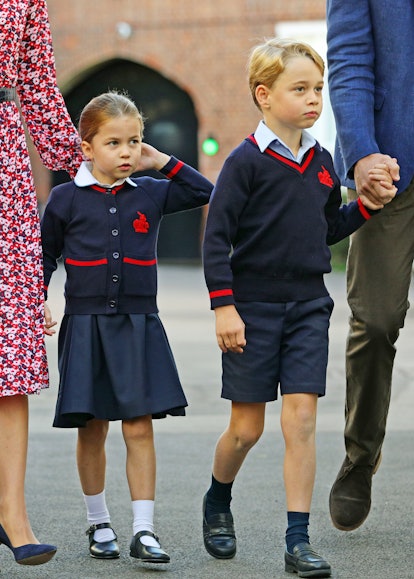 The siblings match in their school uniforms