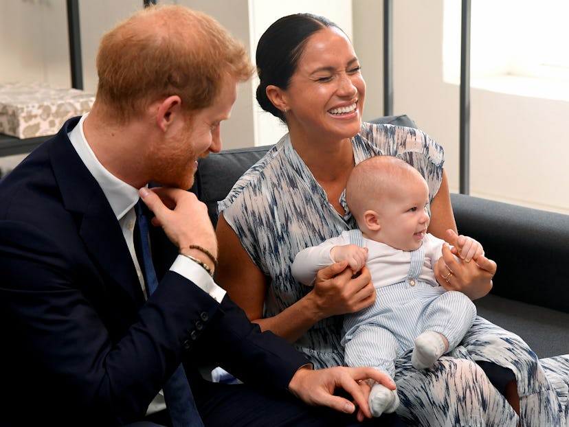Meghan Markle laughs at baby Archie's antics.