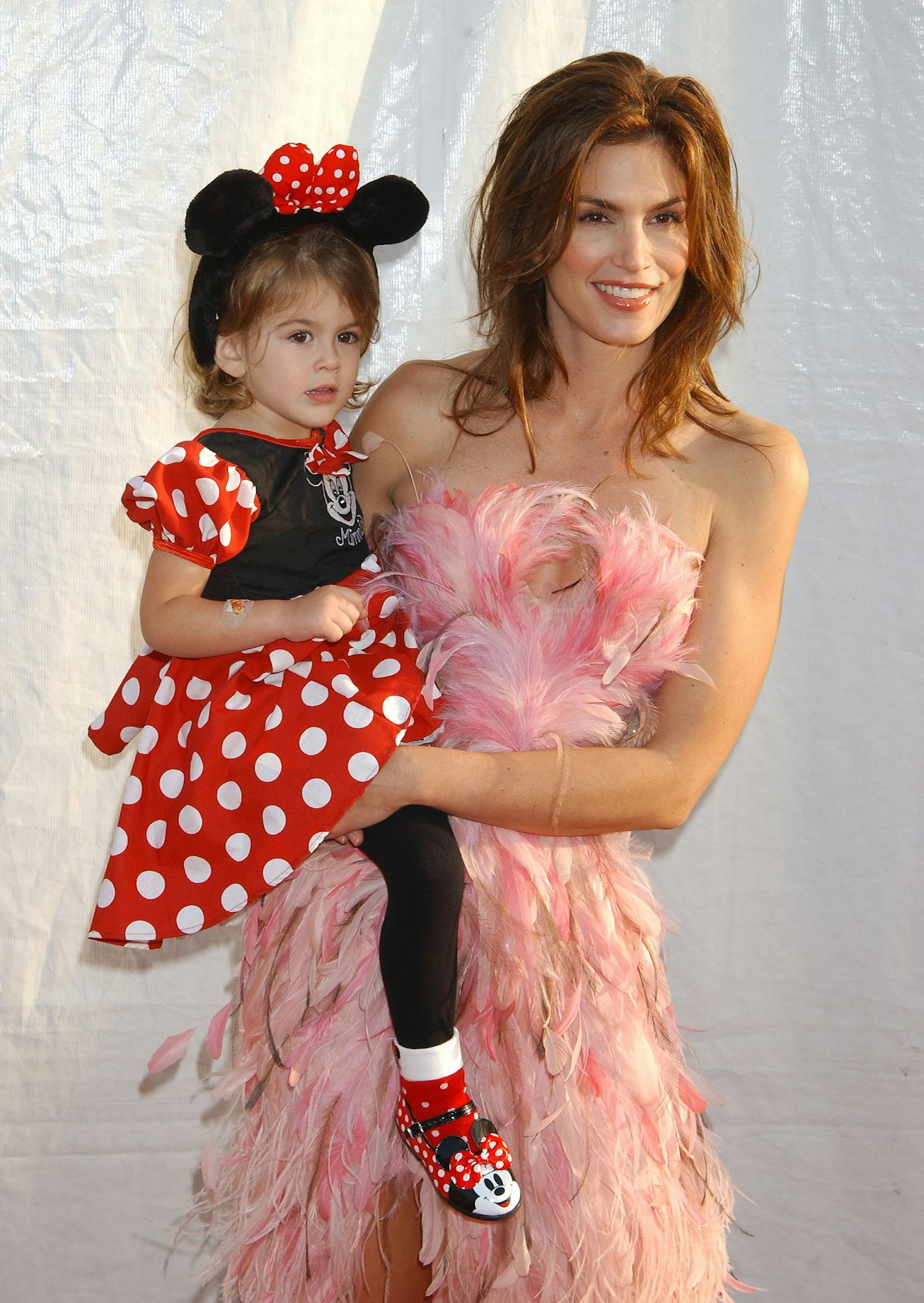 Kaia Gerber dressed as Minnie Mouse with Cindy Crawford in 2003.