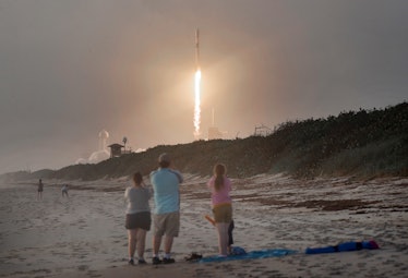 SpaceX launching a batch of Starlink satellites.