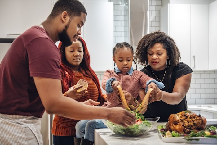 grandmother, mom, dad, girl, getting thanksgiving turkey ready for dinner