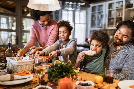 family eating thanksgiving dinner