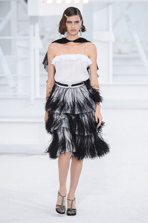 The model wears a look from Chanel's Spring 2021 Hollywood-inspired collection