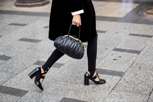 Woman walking while wearing sweatpants & leggings that pass for regular pants