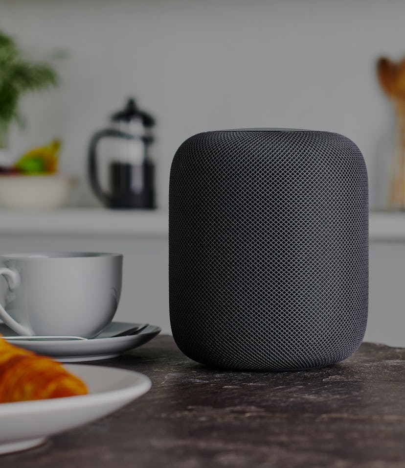 A HomePod on a kitchen table