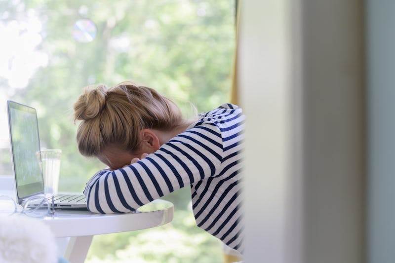 Woman with hangover feels worse through the day.