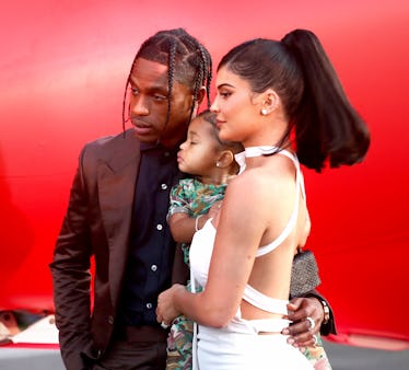 Travis Scott, Stormi, and Kylie Jenner attend the premiere of his documentary.