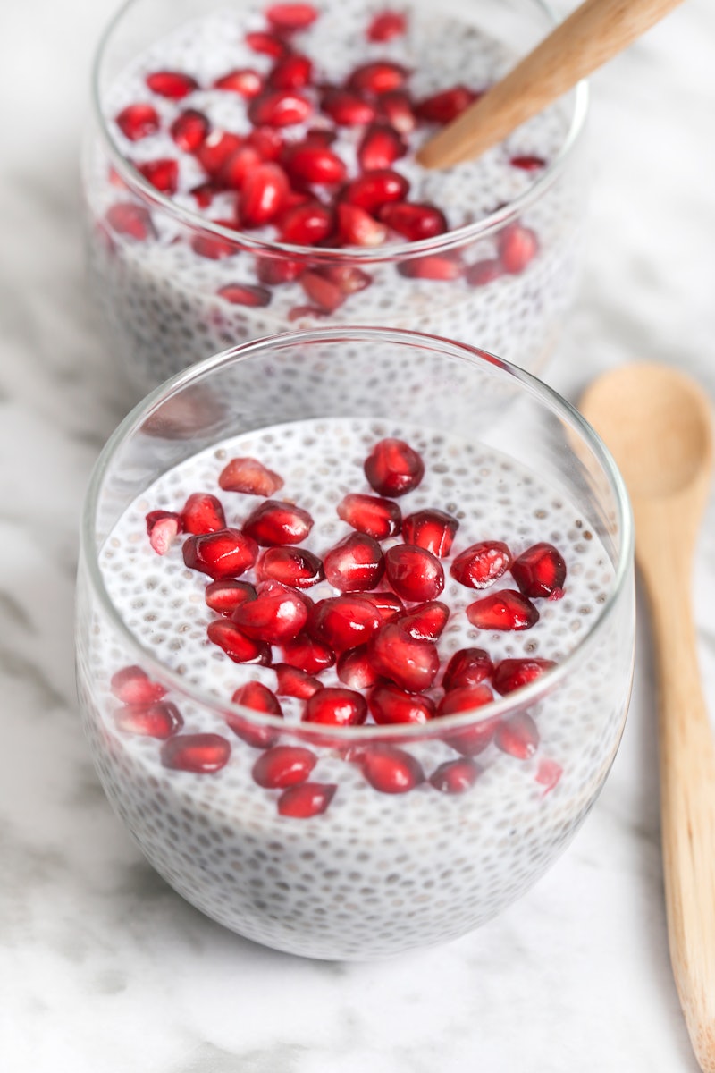 Two cups of chia pudding with pomegranate seeds. Here's what can happen to your body when you have t...