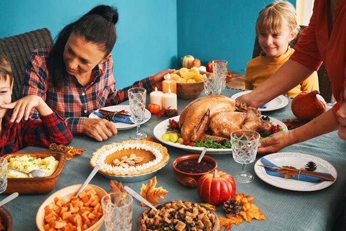 a family having thanksgiving dinner