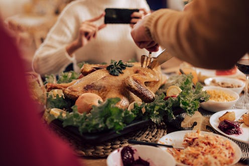 A family thanksgiving table. Experts explain how to respond to difficult political conversations at ...