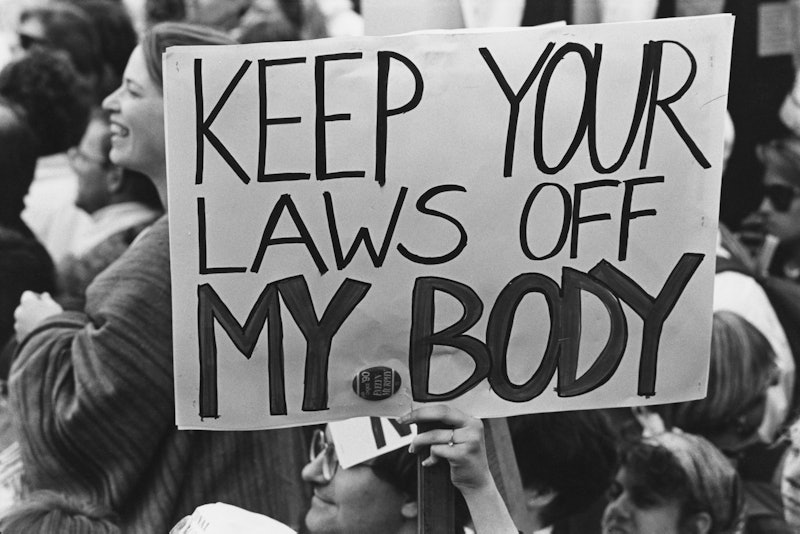 A pro-choice protest sign reading "keep your laws off my body." In this q&a, Whole Woman's Health CE...