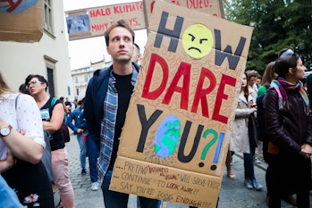Climate protester with sign