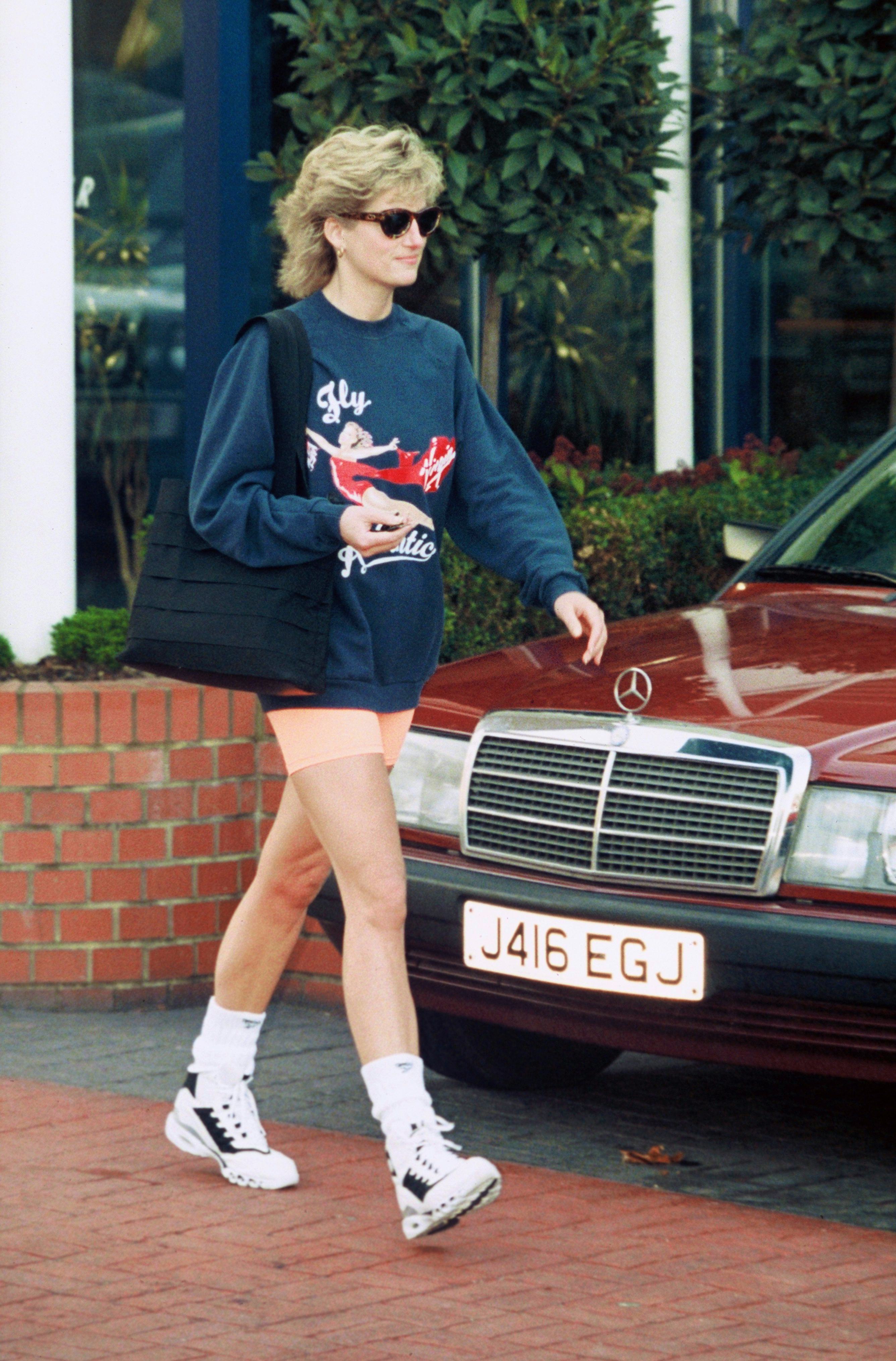 Princess Diana in front of a Mercedes-Benz