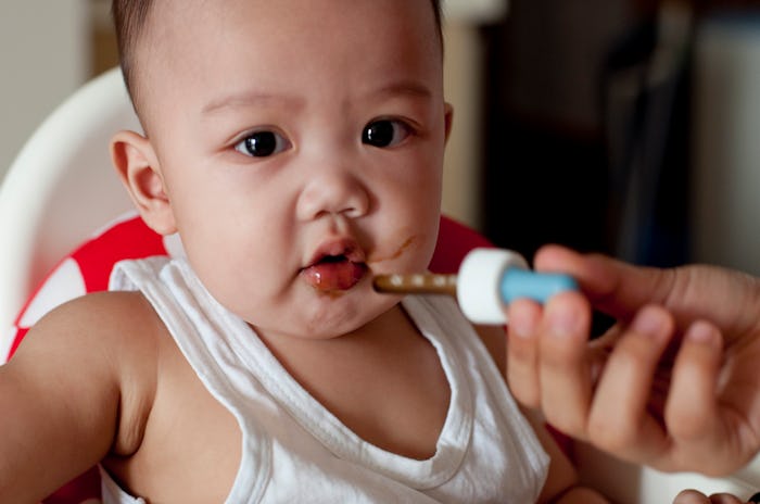 baby taking medicine