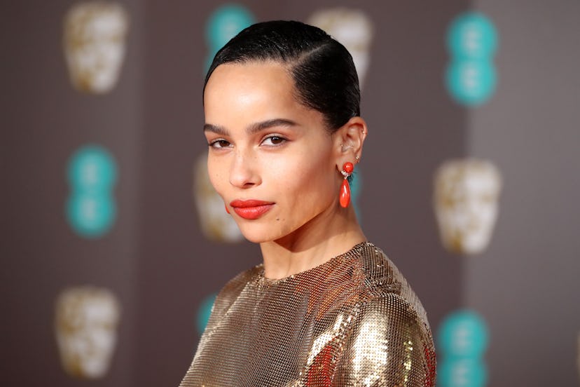 Kravitz wore lipstick that matched her earrings for one red carpet.