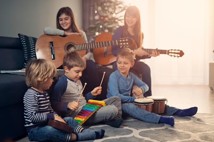 kids performing holiday song at home