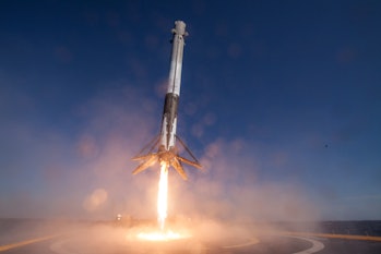 A Falcon 9 rocket coming in to land.