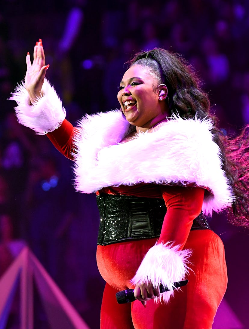 Lizzo wearing a Santa costume is a fount of inspiring self-love quotes.