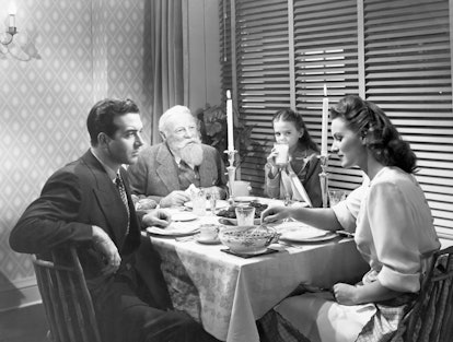 A family having a dinner in "Miracle On 34th Street" movie