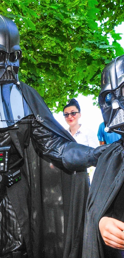 The 2014 presidential candidate Darth Vader meets with a young fan.