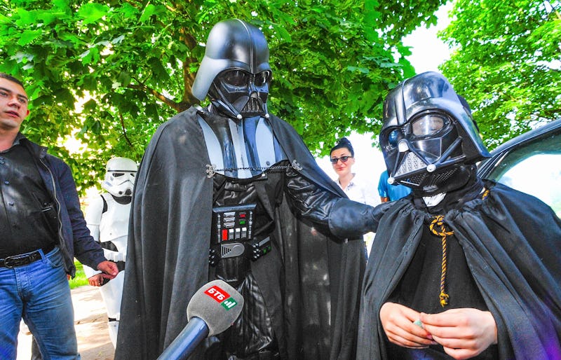 The 2014 presidential candidate Darth Vader meets with a young fan.