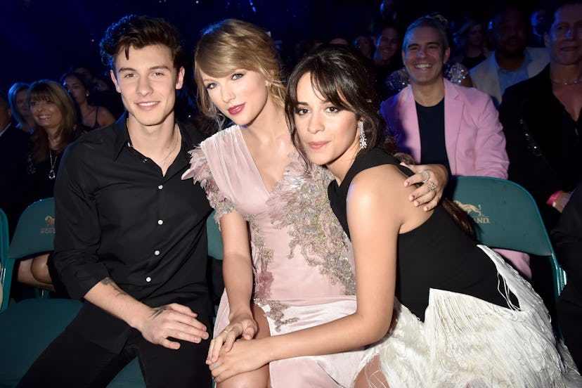 Shawn Mendes, Taylor Swift, and Camila Cabello pose for a photo.