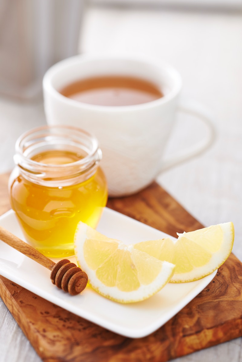 A hot toddy in a white mug has surprising health benefits.
