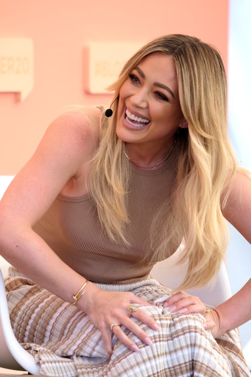 Hilary Duff's curtain bangs are on trend.