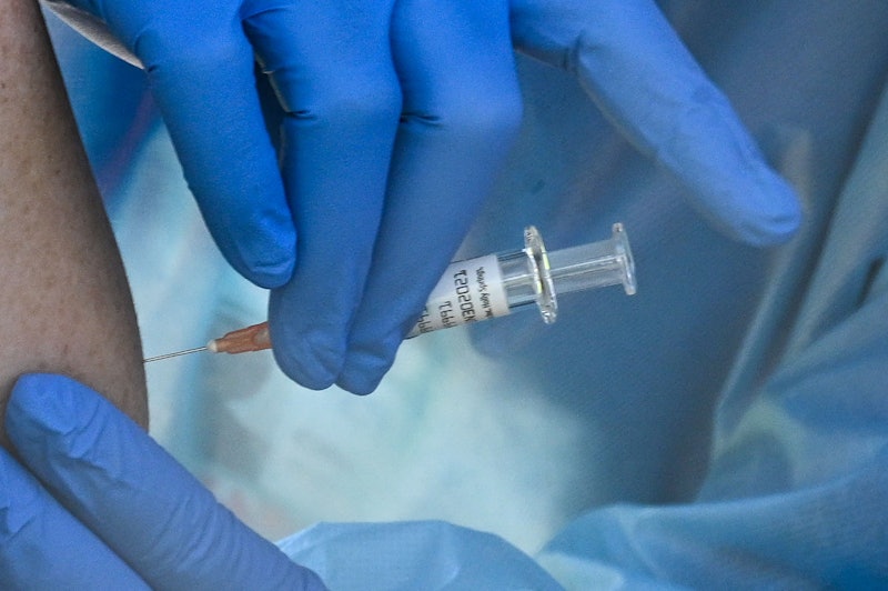 A person receives a coronavirus vaccine.