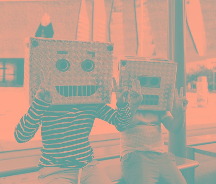 Two children with robot heads.