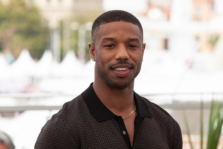 Michael B. Jordan steps out in a collared tee.
