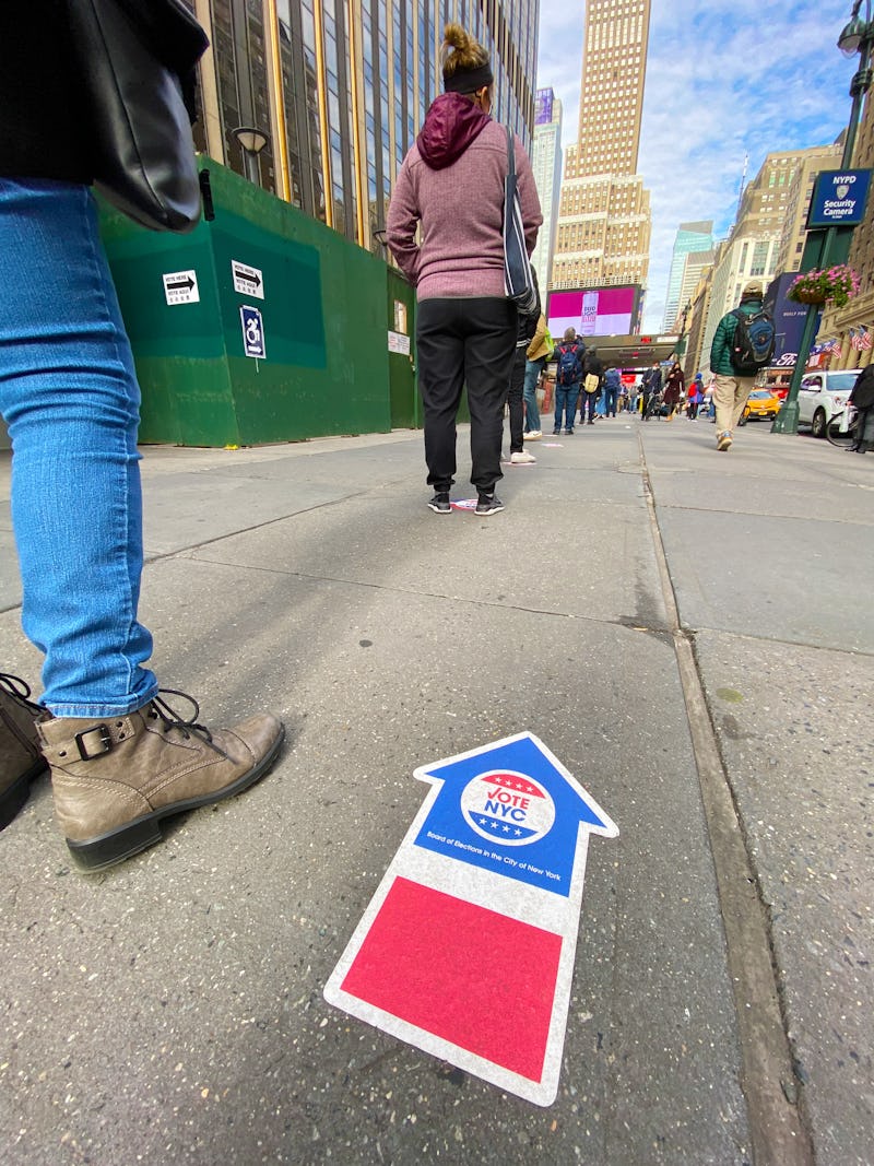 A line of voters waiting to vote on election day 2020. Here's how long it can take to vote.