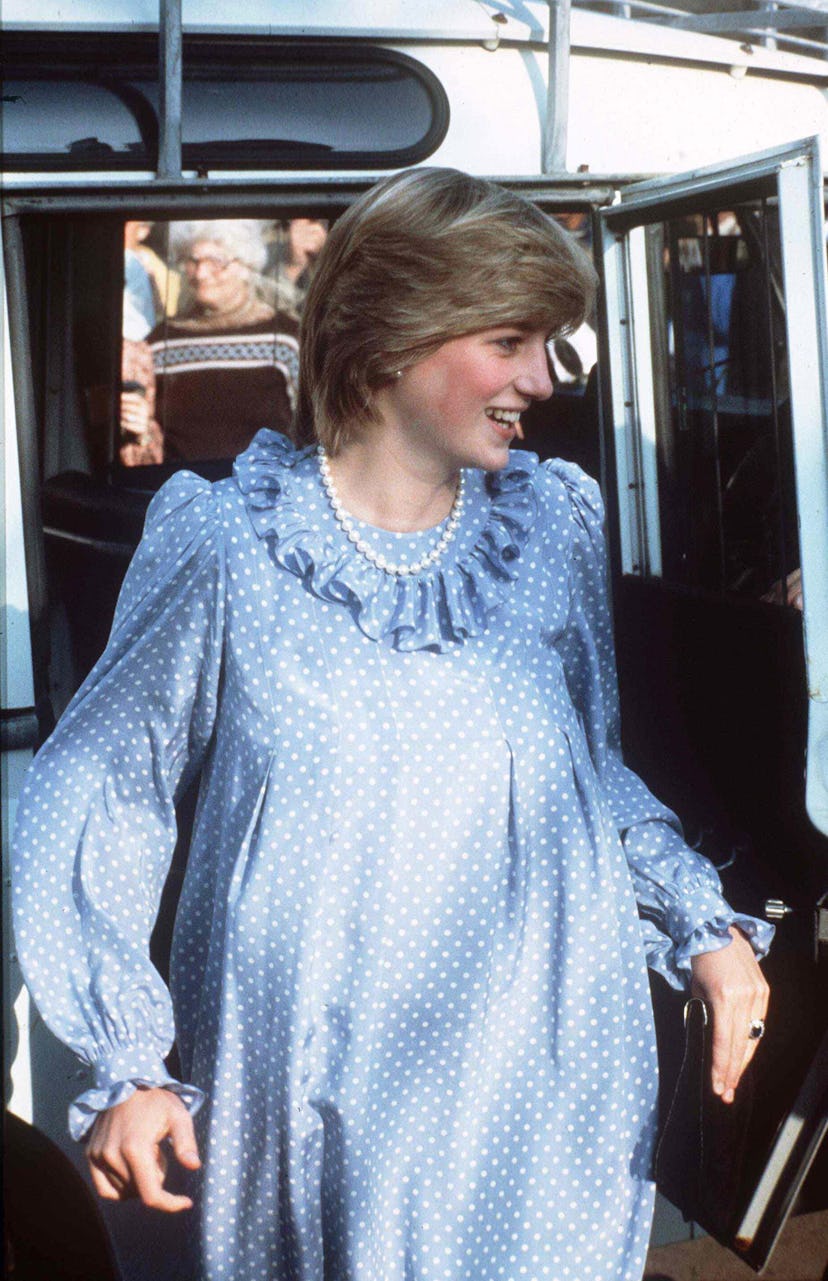 Princess Diana pregnant in a blue and white polka dot dress, 1982.