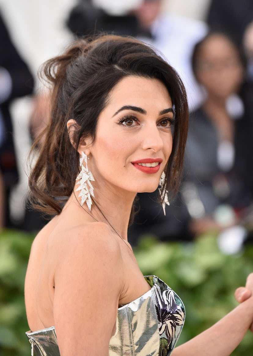 Amal Clooney's most iconic hairstyles: Met Gala 2018 ponytail.