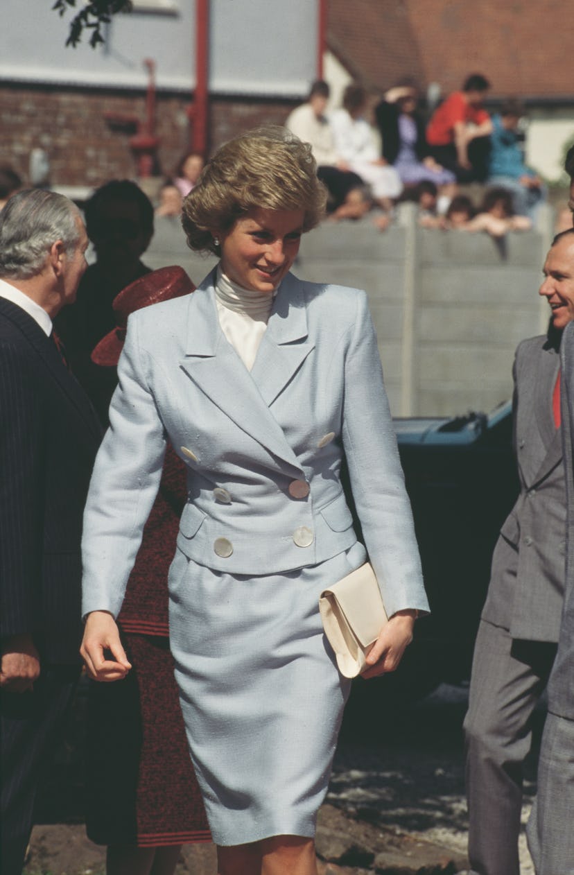 Princess Diana wears a white turtleneck.