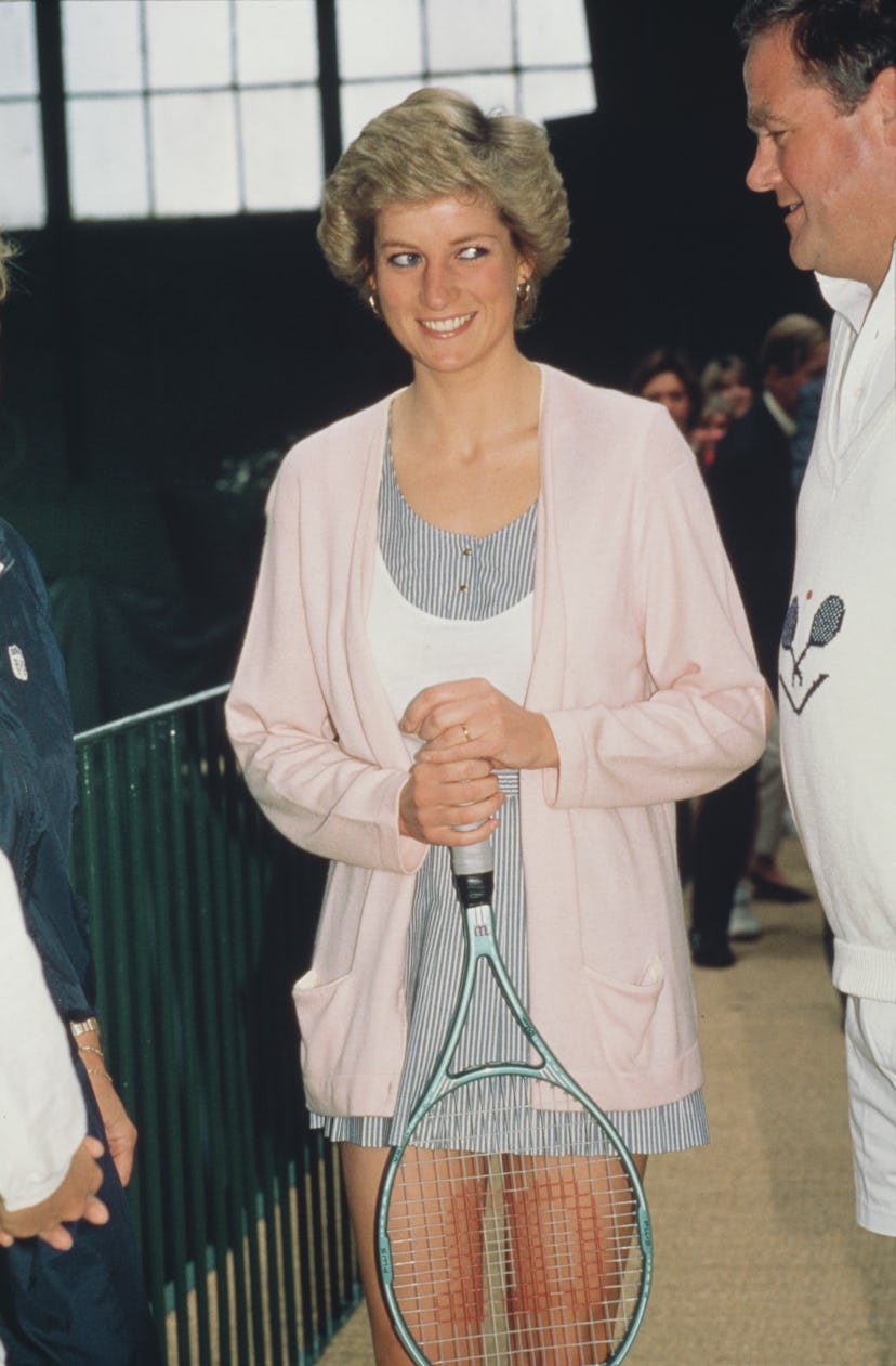 Princess Diana playing tennis.