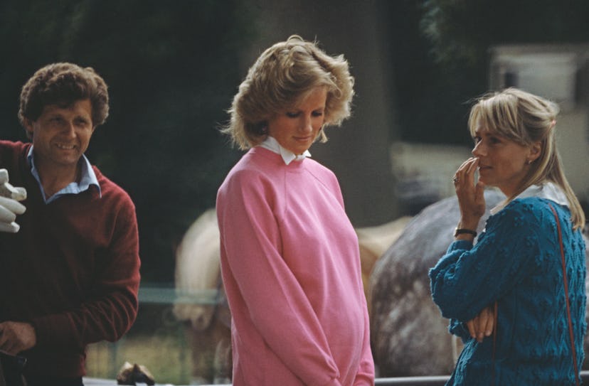 Princess Diana wears a maternity sweater.