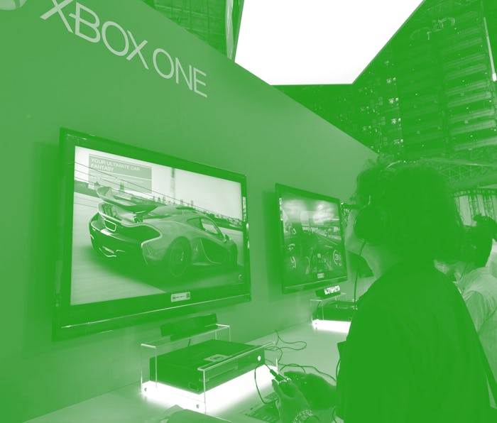 A person plays a game on an Xbox One. 