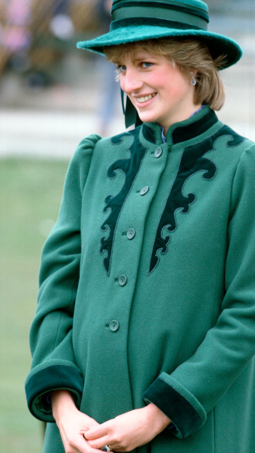 Princess diana in a green maternity coat