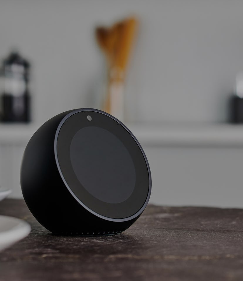 Amazon Echo Spot on a kitchen countertop.
