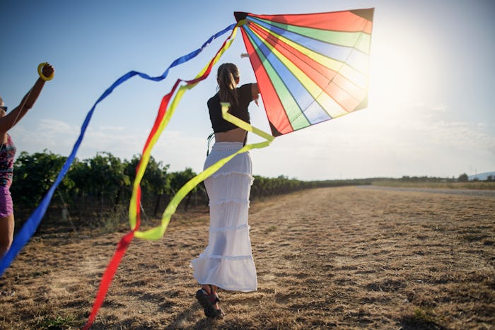 woman flying kite