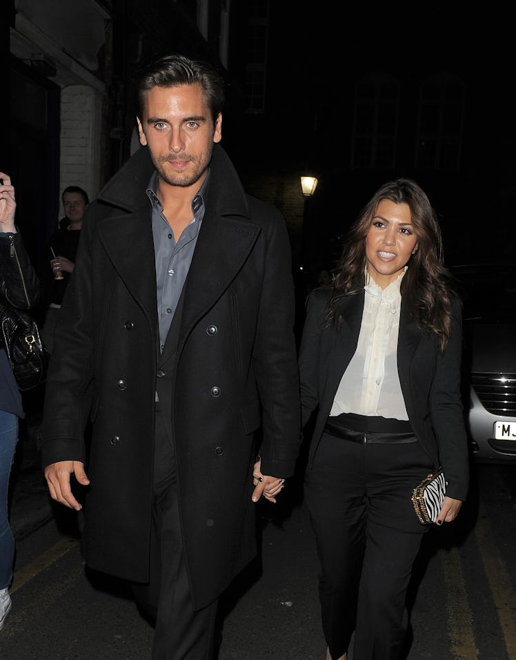 Scott Disick and Kourtney Kardashian step out hand in hand.