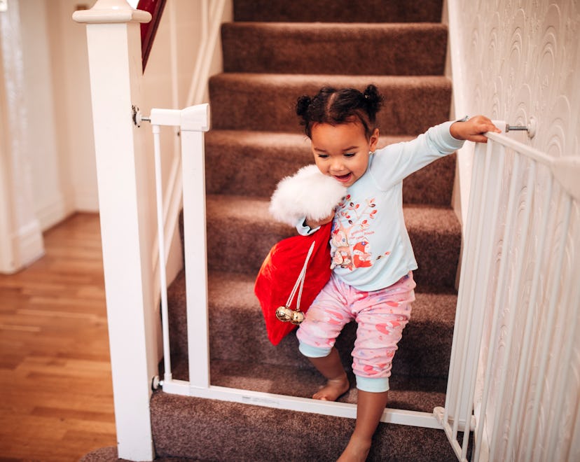 little girl with christmas stocking