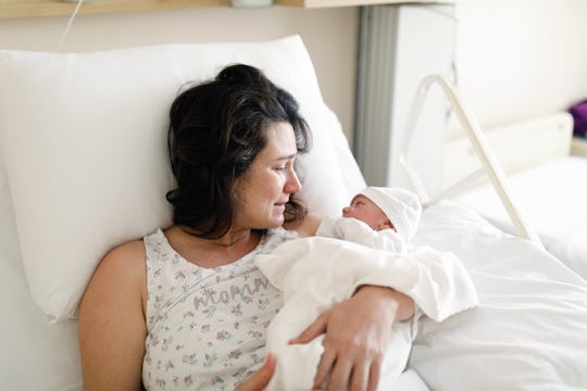 mom with newborn baby in hospital