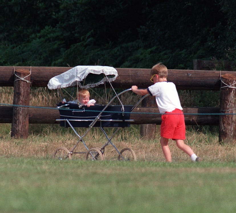 Prince William pushes Princess Beatrice in a pram, 1989.